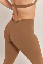 Leggings crema con bolsas laterlaes